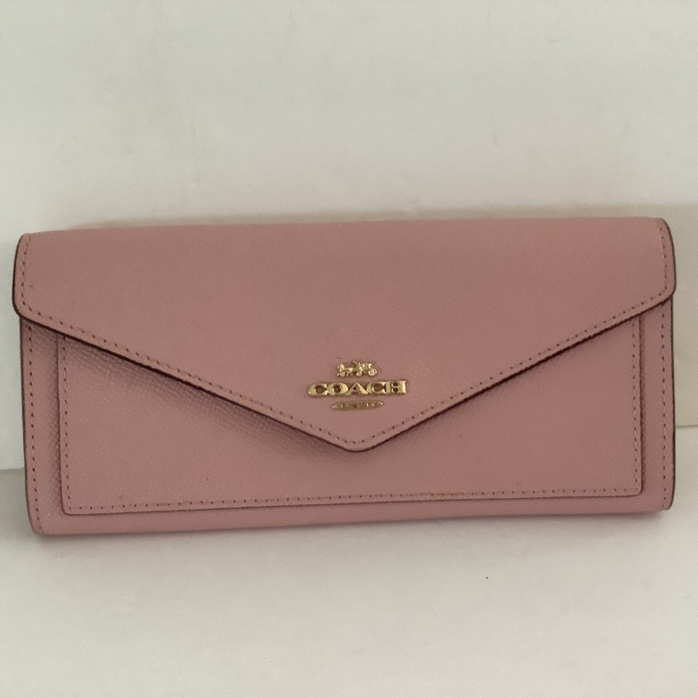 Genuine Coach Pink Wallet. Brand New  back zipper for coin